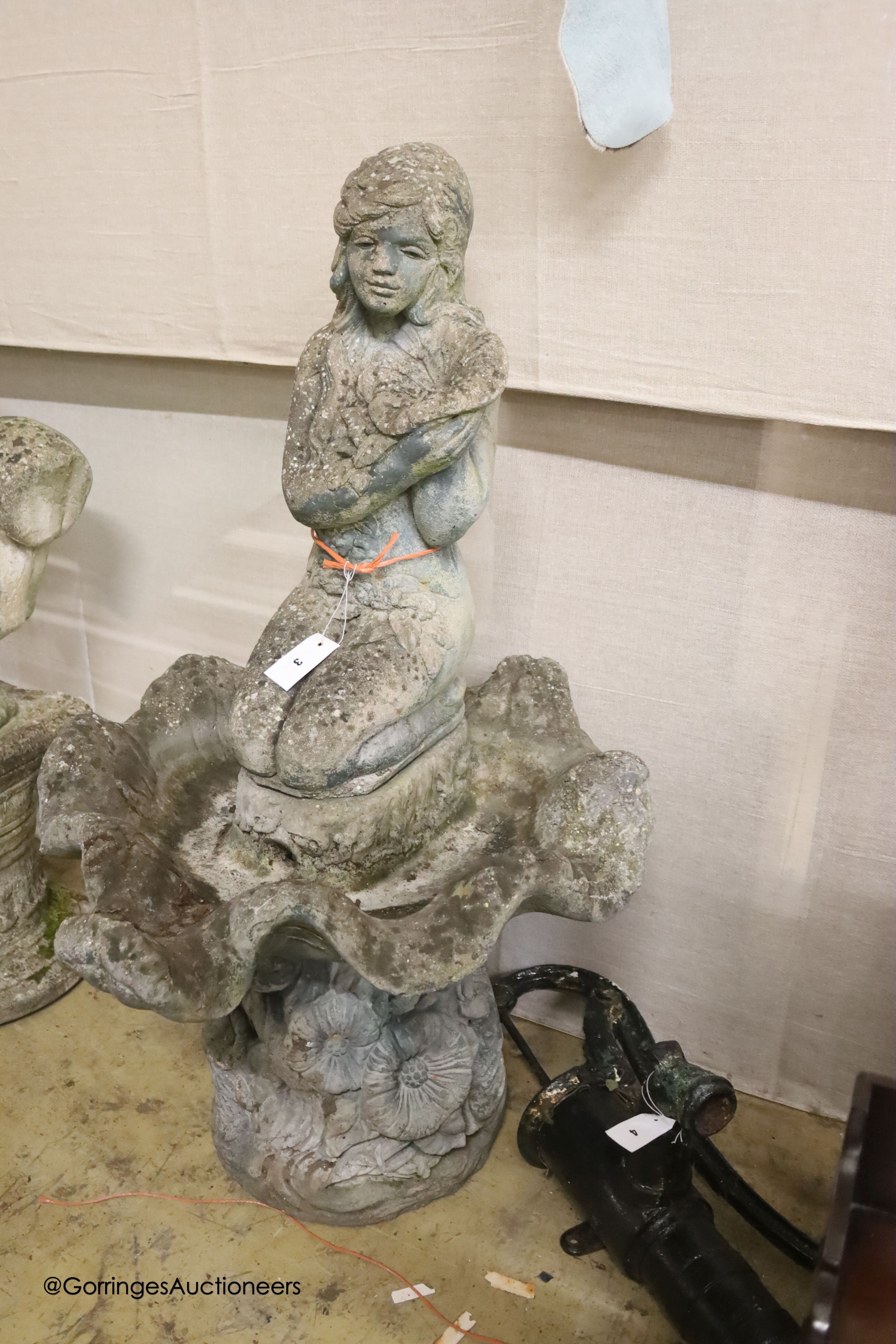 A reconstituted stone figural garden fountain, height 116cm